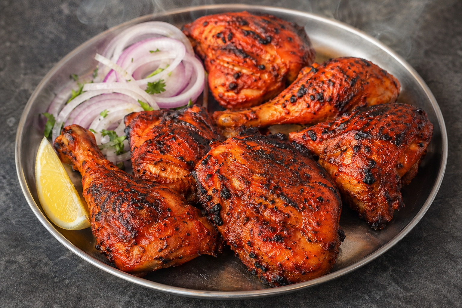 Tandoori chicken with spices from the clay oven